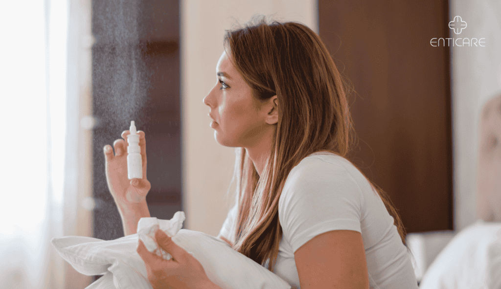 enticare-woman-using-nasal-spray