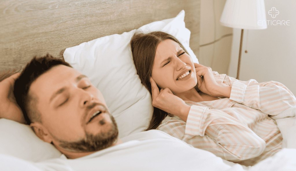 enticare-woman-with-husband-snoring